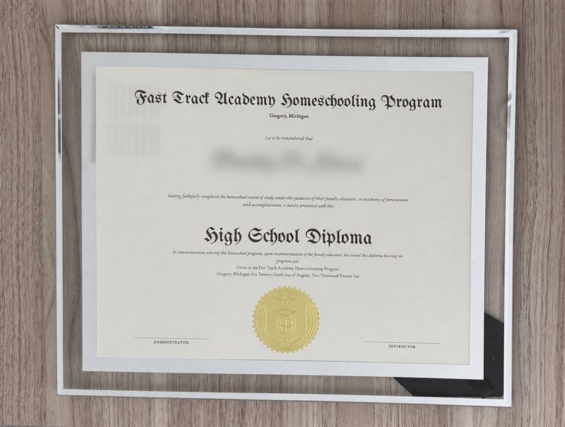 Homeschool diploma in a modern glass frame with an embossed gold seal